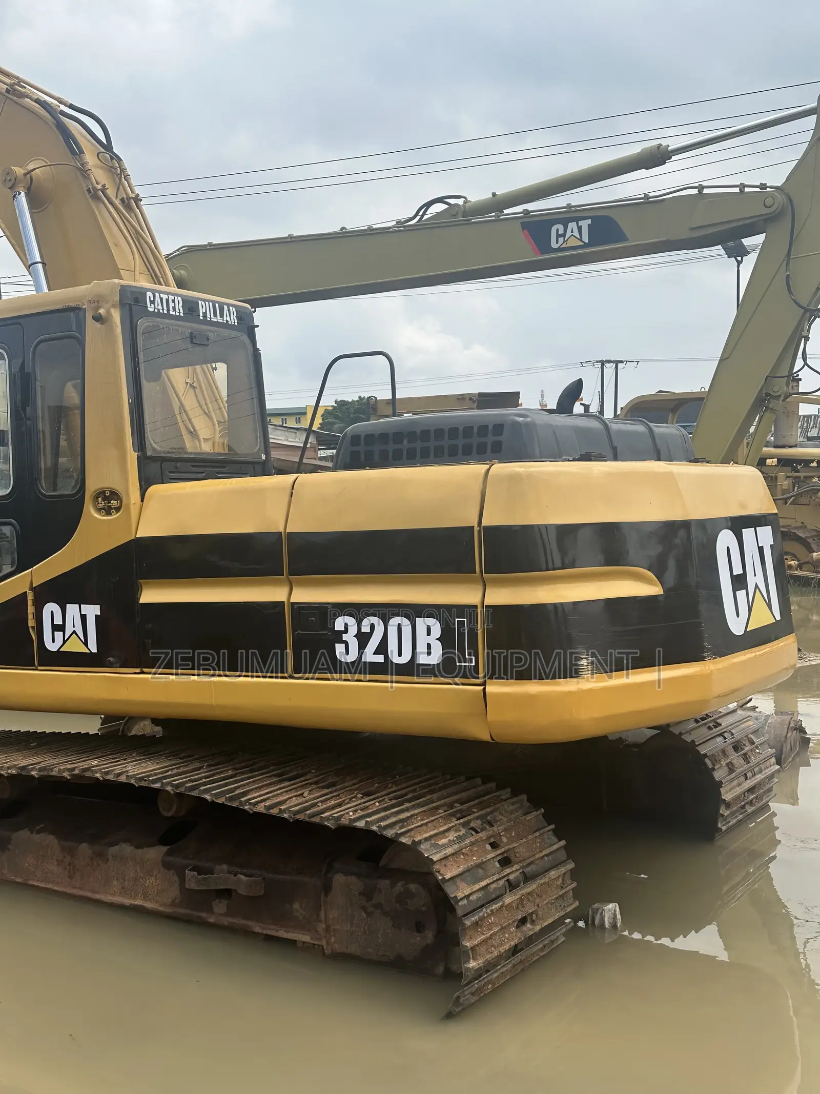 Long Boom Cat Excavator 320 BL for Sale. Price 165M Naira