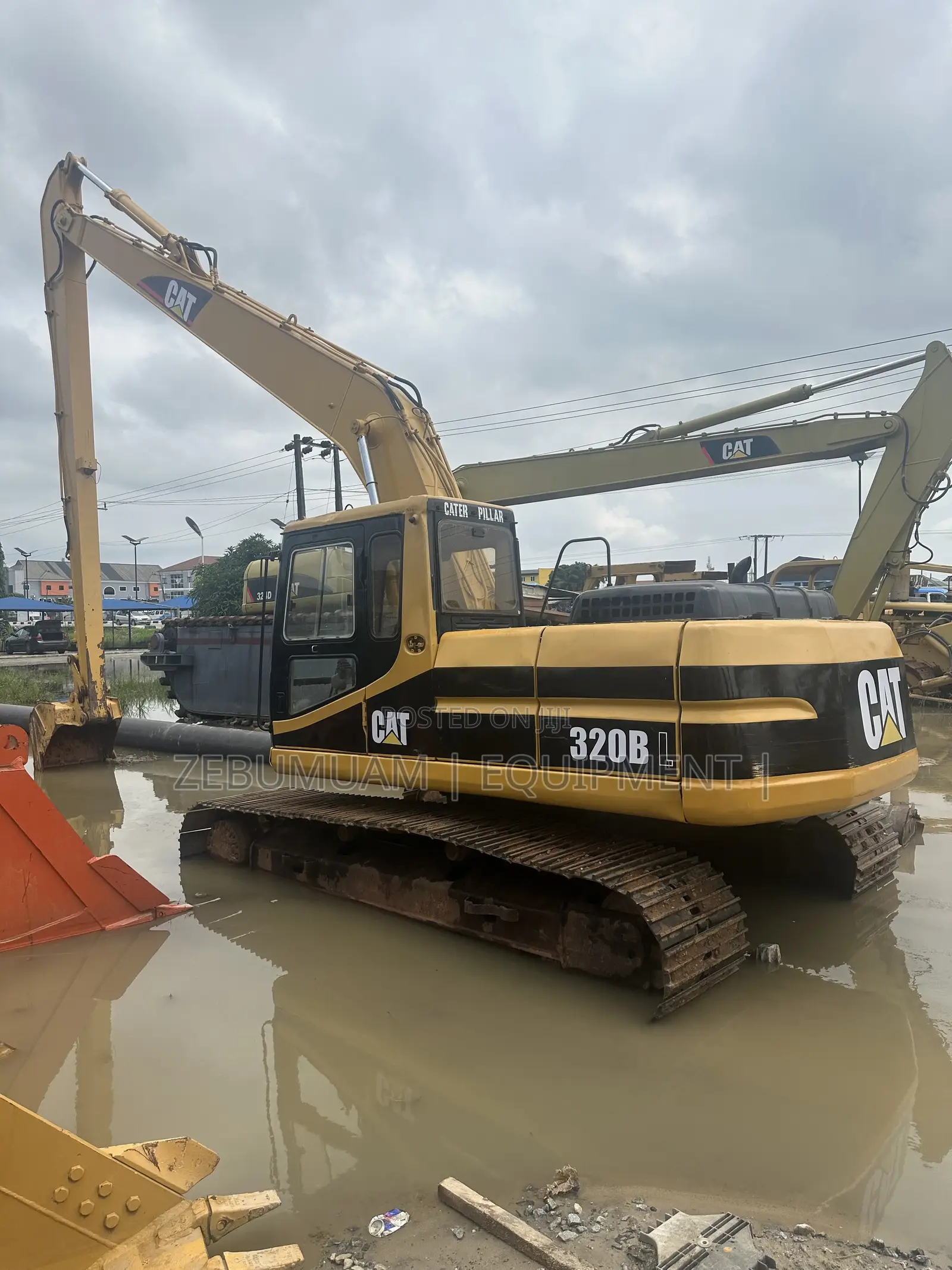 Long Boom Cat Excavator 320 BL for Sale. Price 165M Naira