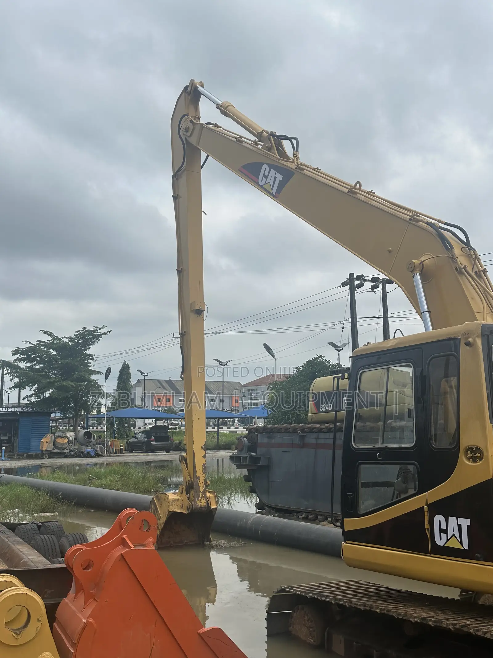 Long Boom Cat Excavator 320 BL for Sale. Price 165M Naira