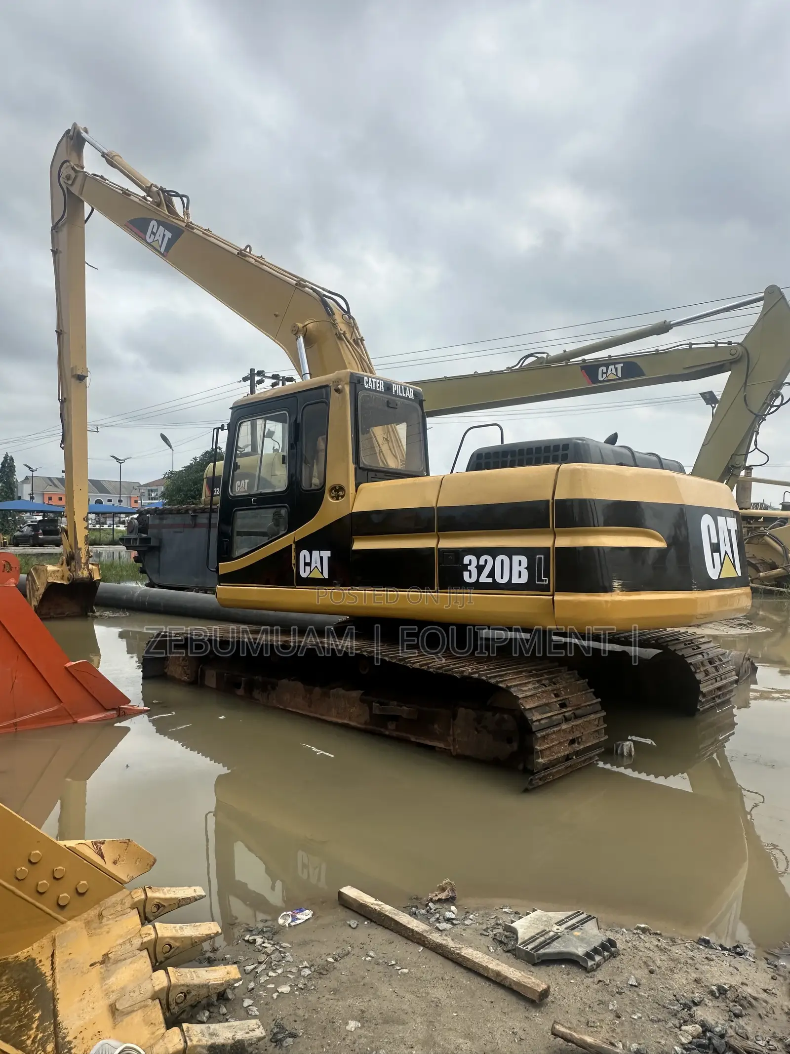 Long Boom Cat Excavator 320 BL for Sale. Price 165M Naira