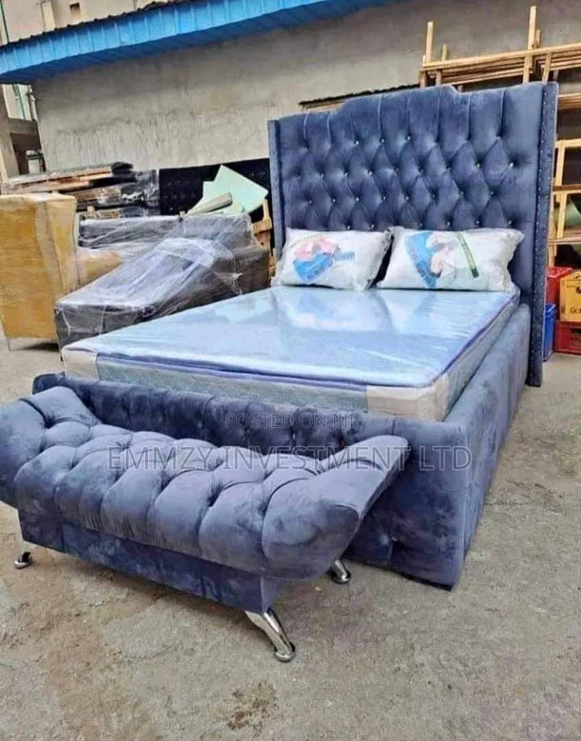 41⁄2by6 Upholstery Bedframe With Footrest and Mattress Available