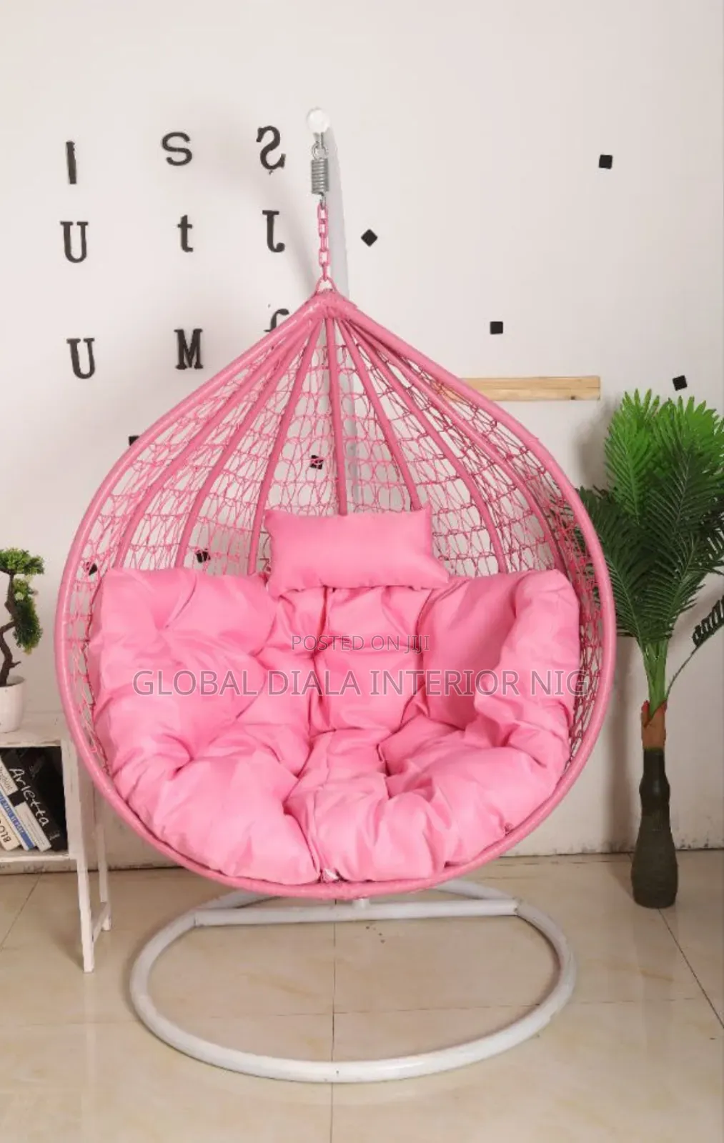Pink Hanging Egg Chair Features a Steel Stand