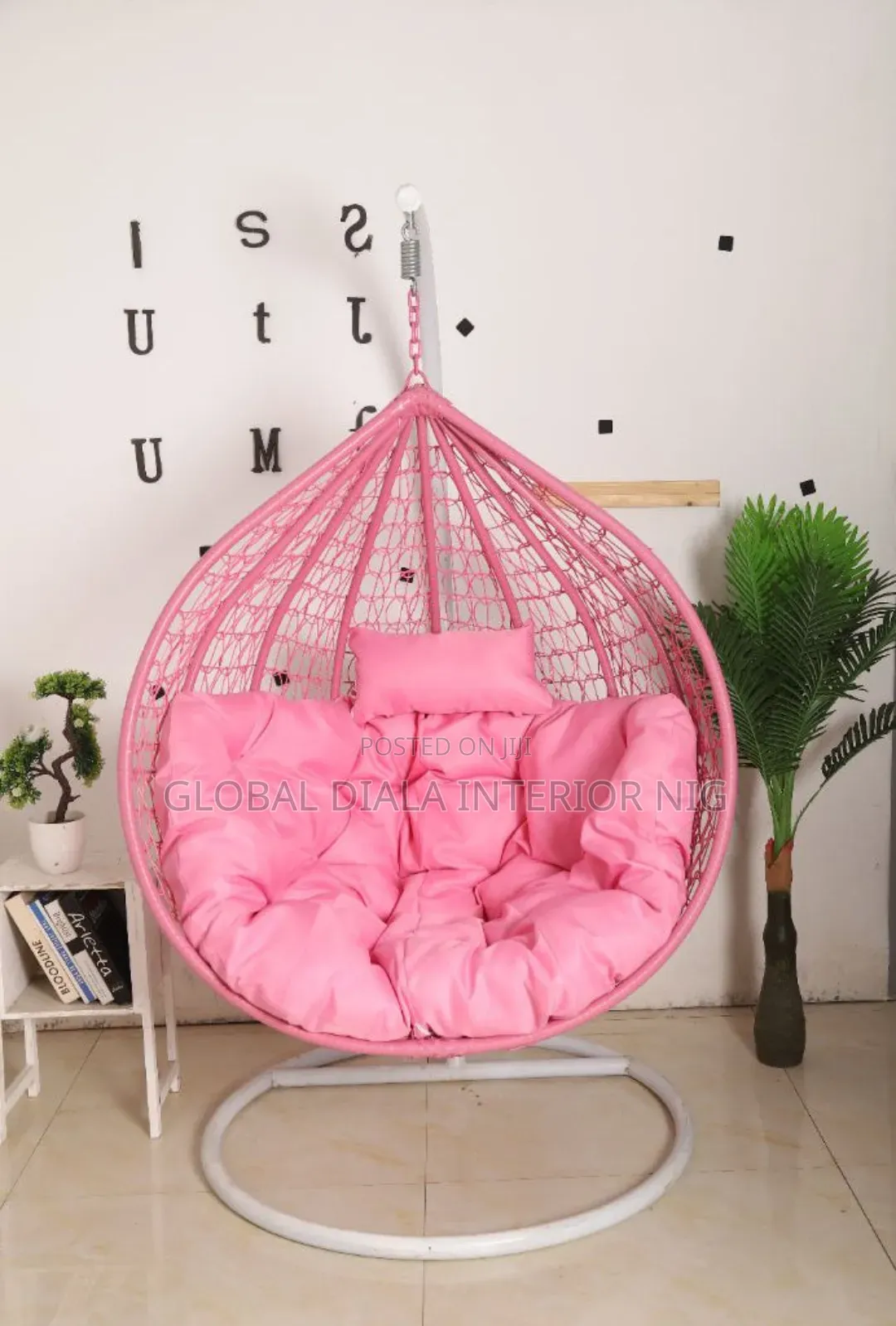 Pink Hanging Egg Chair Features a Steel Stand