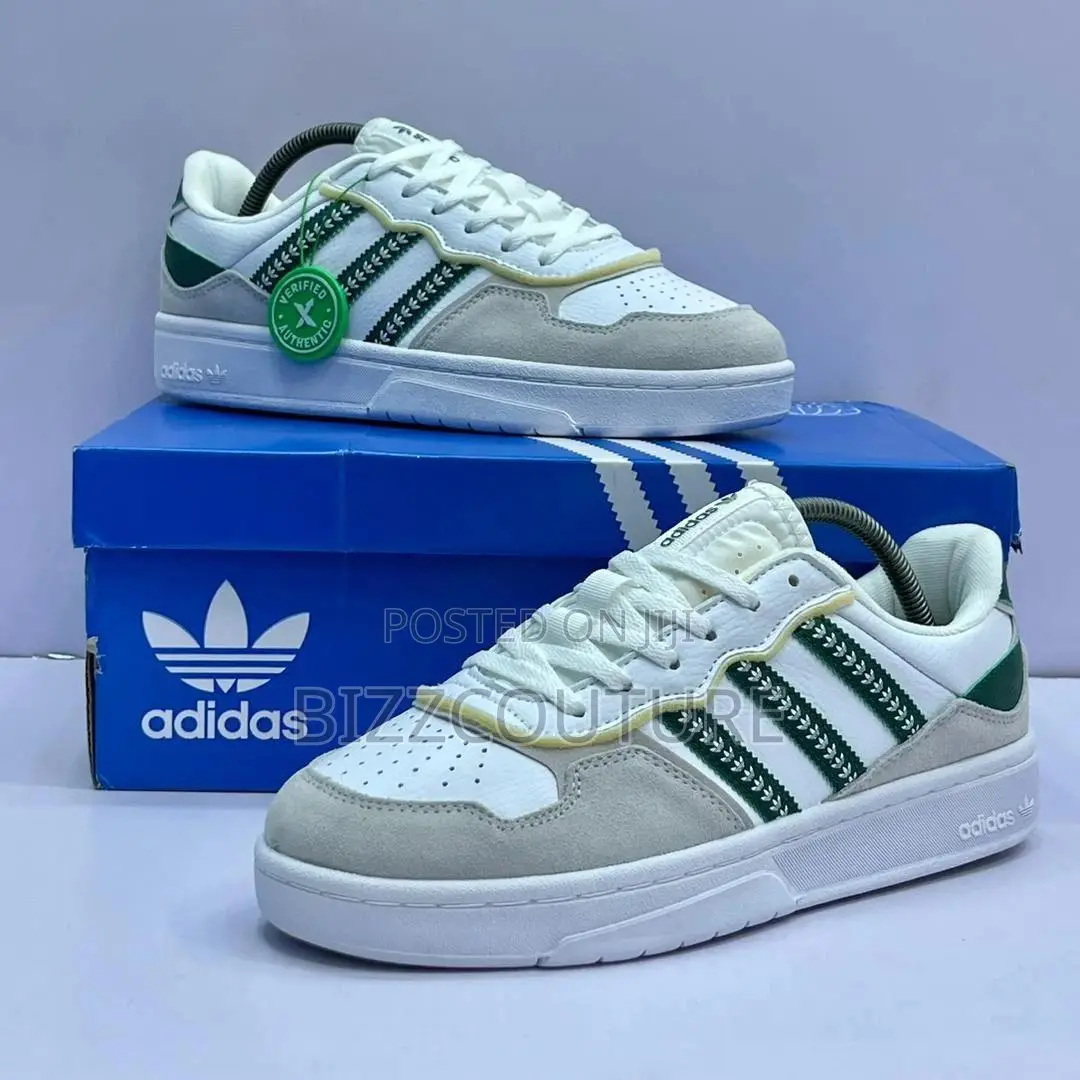 Original ADIDAS Tyshawn Low Sneakers Available in Store