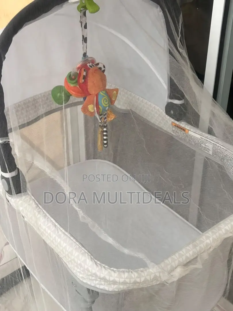 Cozy Adjustable Height Baby Bassinet With Rattle and Mosquito Net