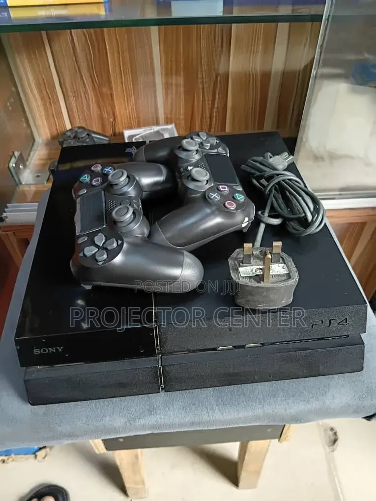 PS4 Fat With 2Pads and 10Games
