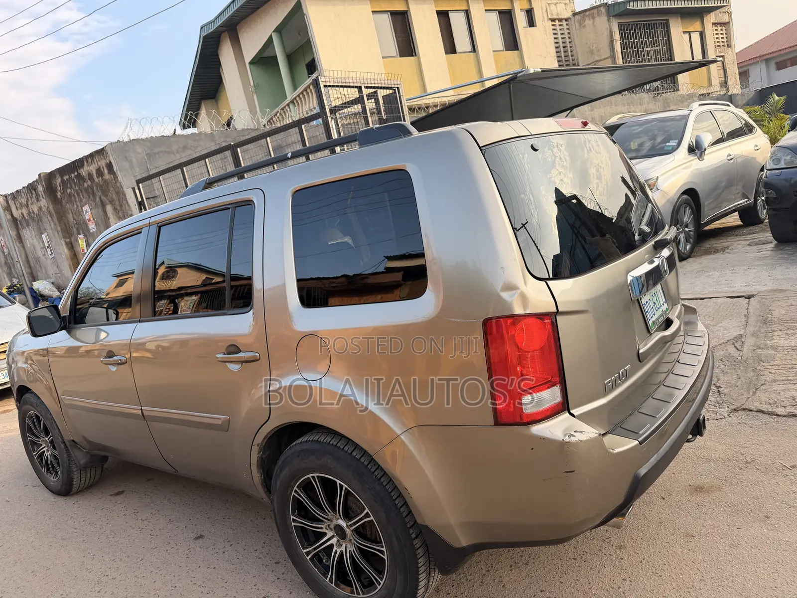 Honda Pilot EX-L 4dr SUV 4WD (3.5L 6cyl 5A) 2010 Gold