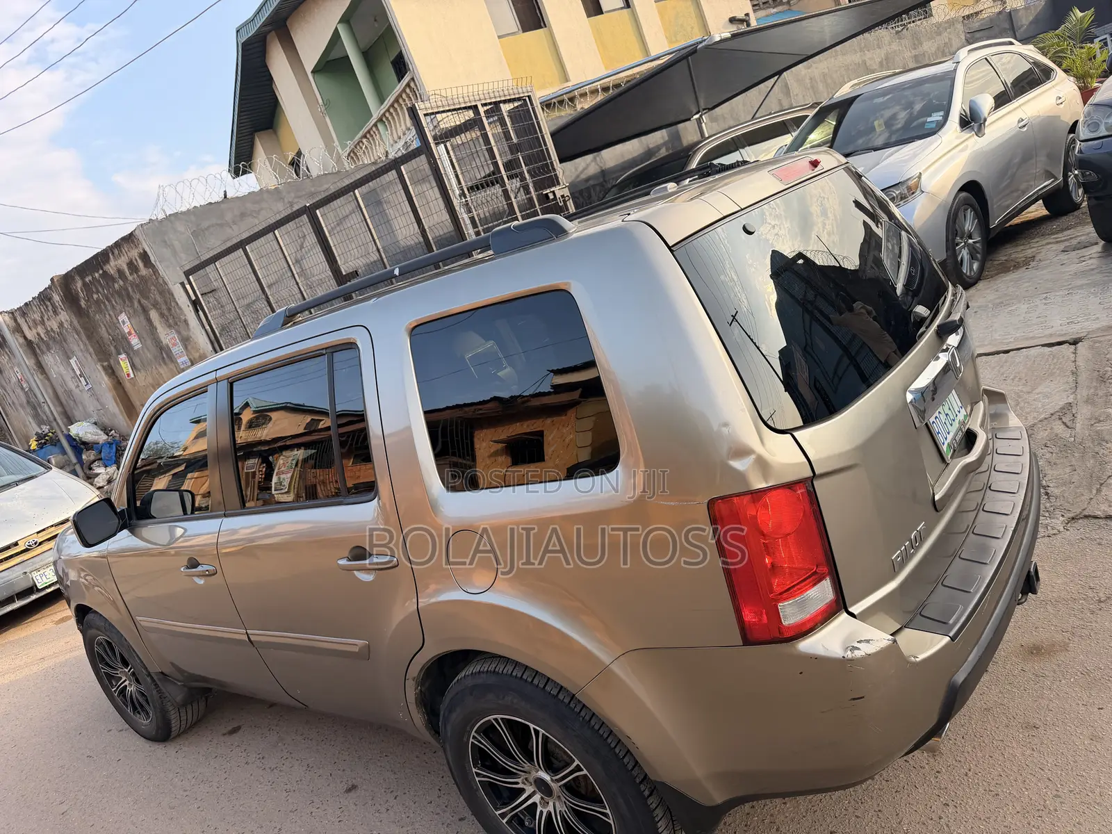 Honda Pilot EX-L 4dr SUV 4WD (3.5L 6cyl 5A) 2010 Gold