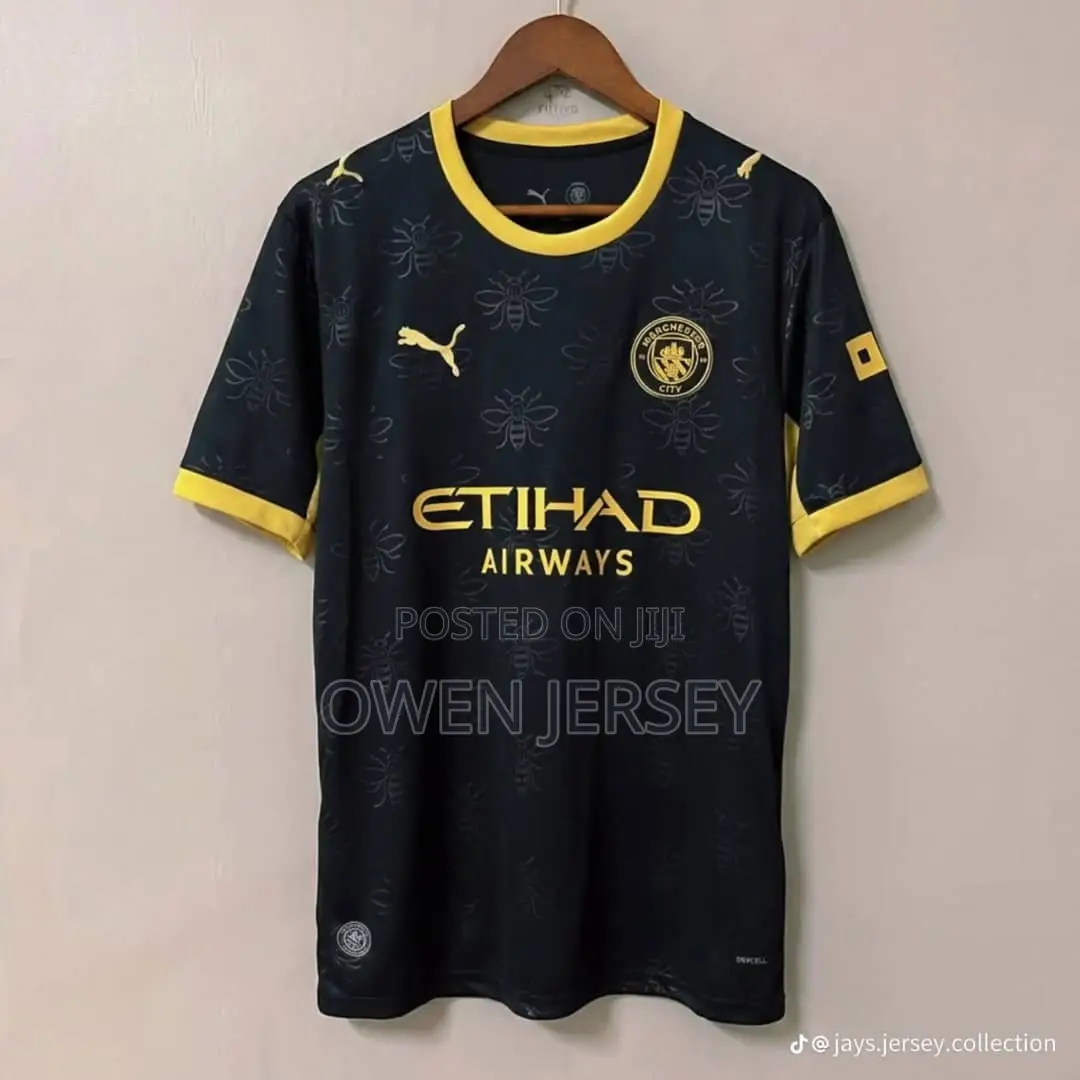 Manchester City Black Gold Football Jersey – Premium Away Style.