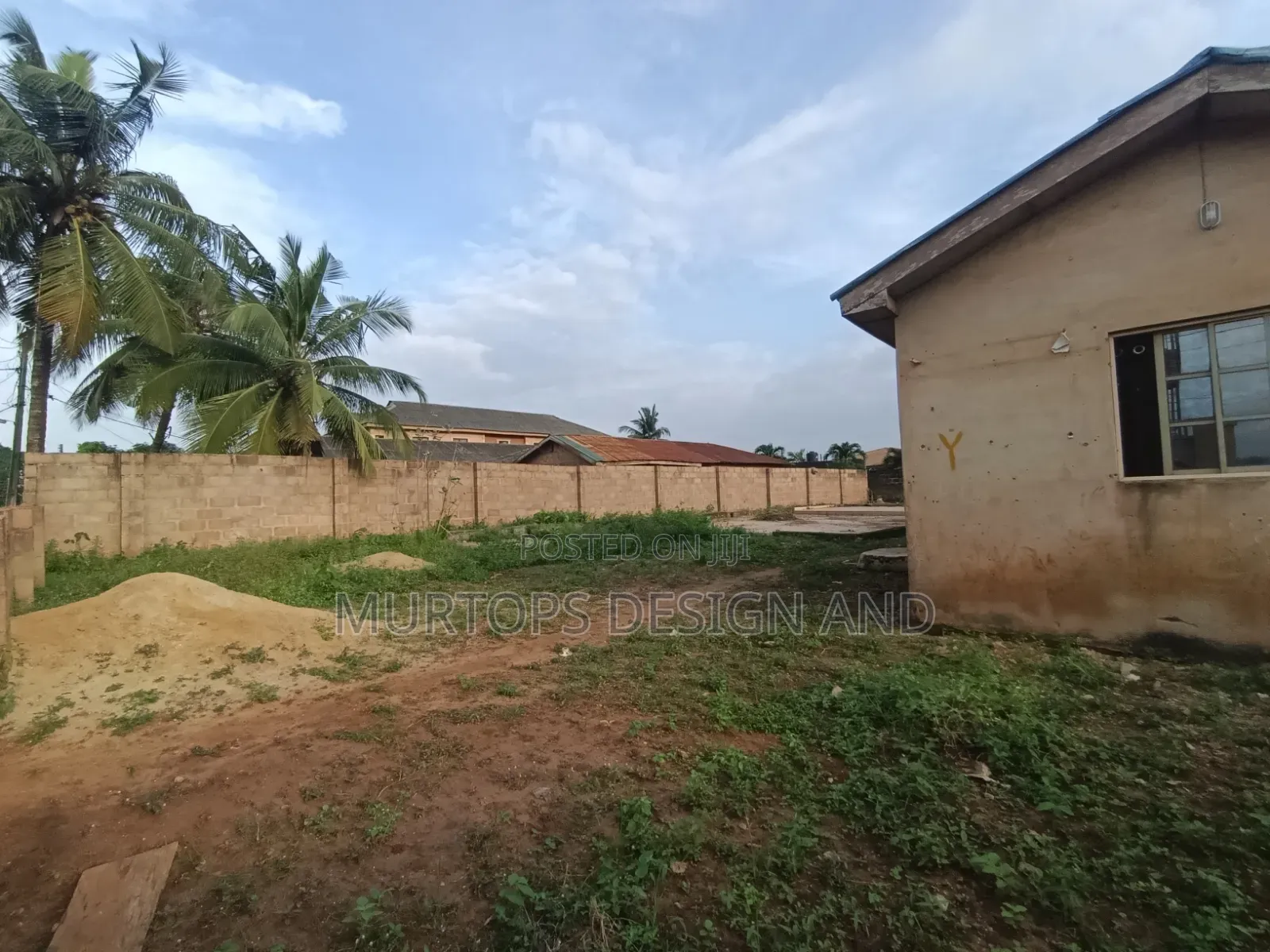 A Table Land With 2 Units of Mini Flat on a Corner Piece of Land