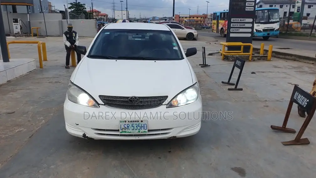 Toyota Camry LE 4dr Sedan (2.4L 4cyl 4A) 2004 White