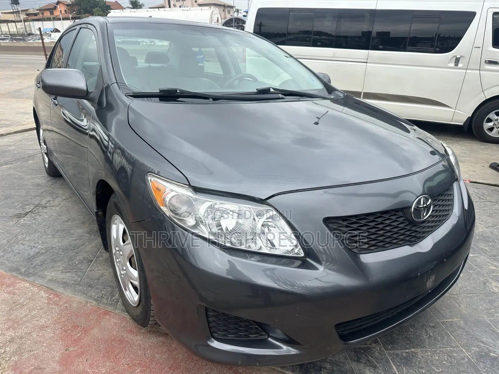 Toyota Corolla Base 4dr Sedan (1.8L 4cyl 5M) 2009 Gray