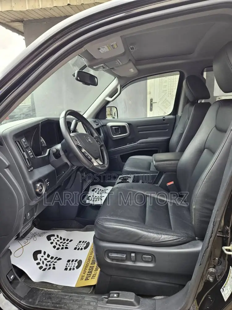 Honda Ridgeline RTL 4dr Crew Cab 4WD SB w/Leather (3.5L 6cyl 5A) 2014