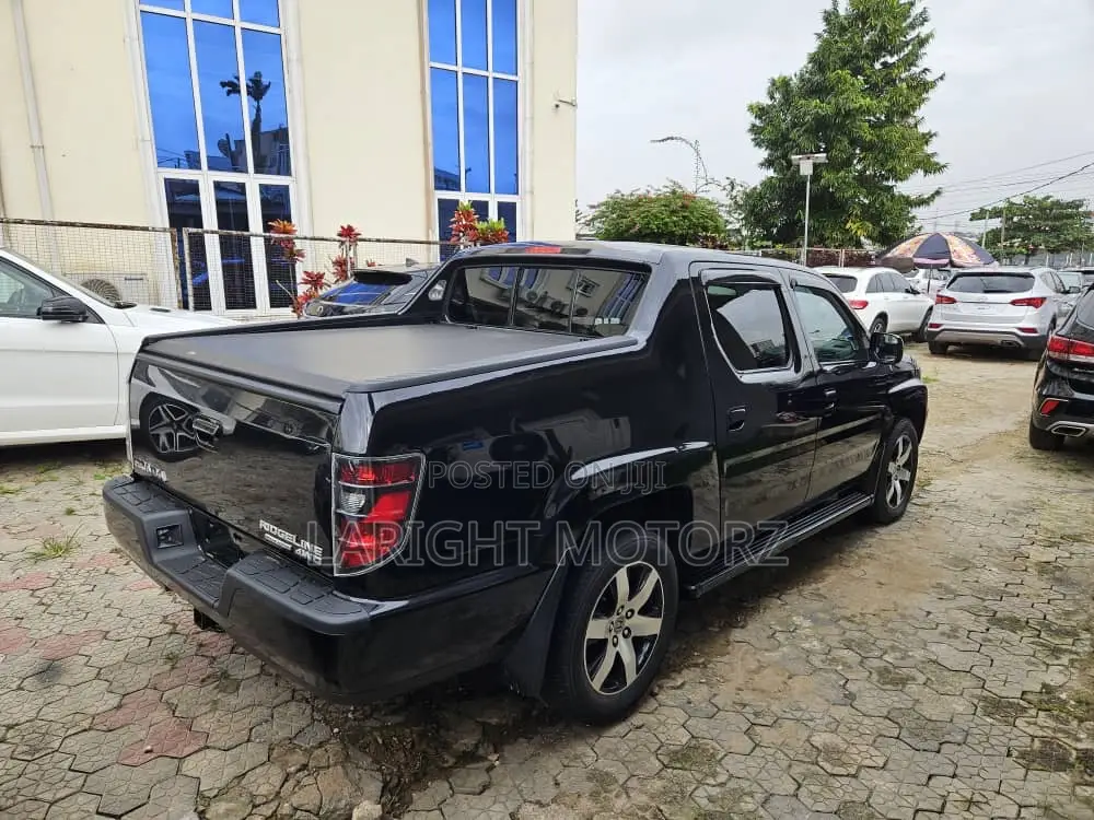 Honda Ridgeline RTL 4dr Crew Cab 4WD SB w/Leather (3.5L 6cyl 5A) 2014