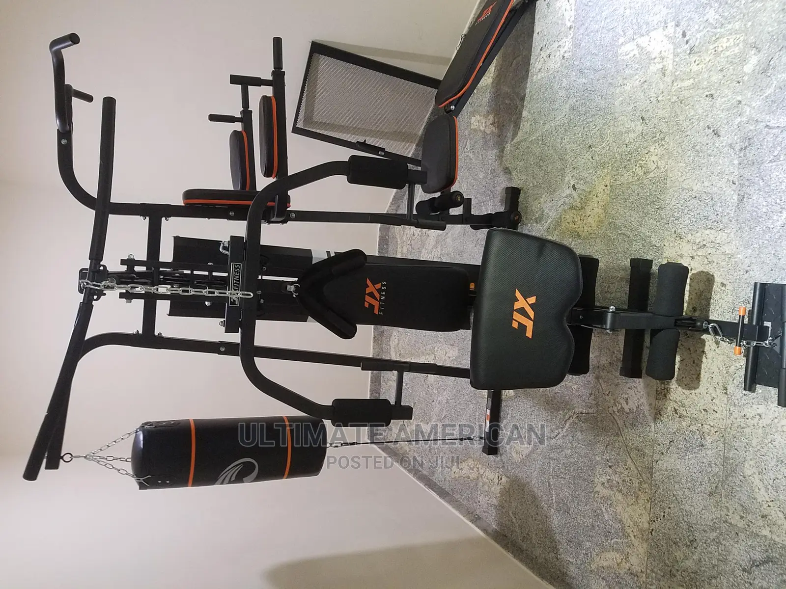 Home Gym With Punching Bag and Sit-Up Bench