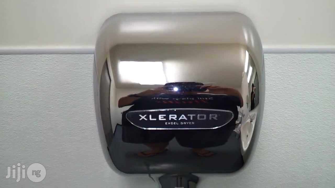 Modern Hand Dryer In Toilet