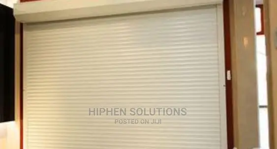 White Perforated Rolling Shutters Garage Door BY HIPHEN SOLUTIONS