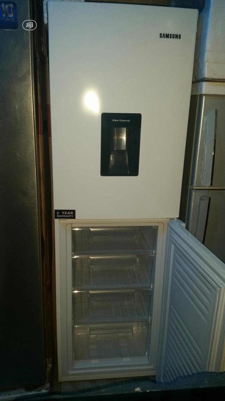 Samsung Fridge and Freezer With Water Dispenser.
