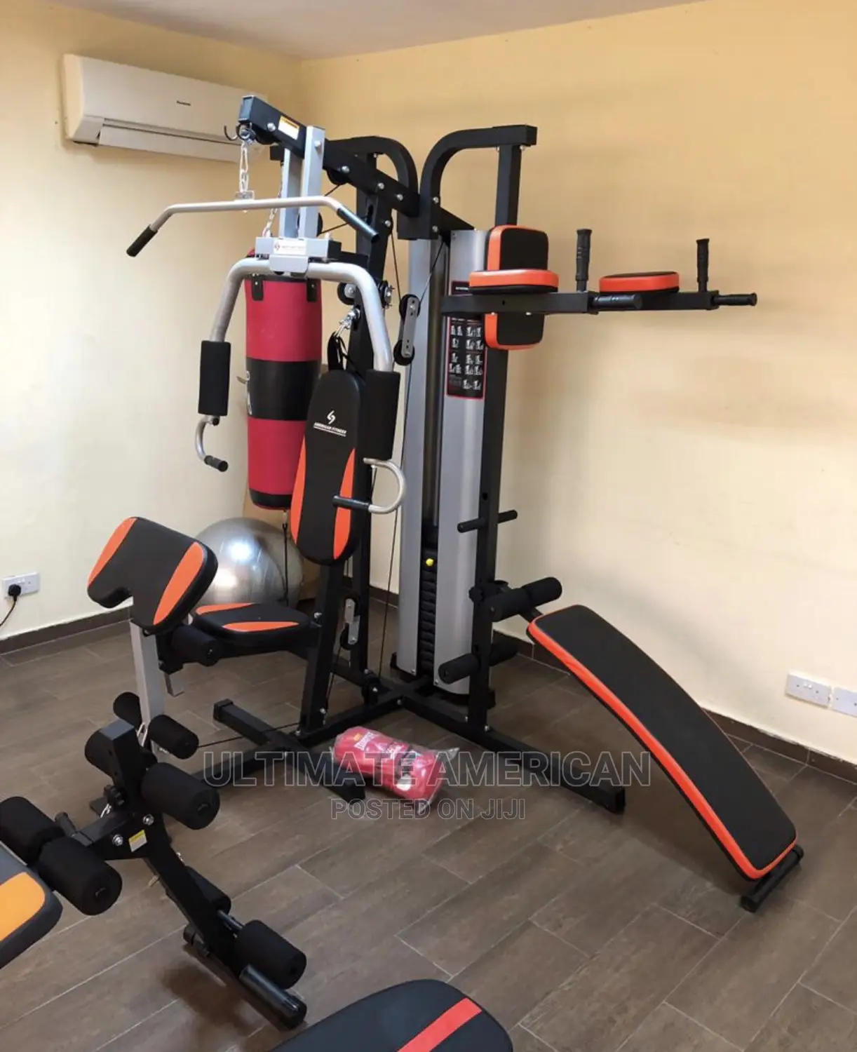 Station Gym With Sit-Up Bench Punching Bag