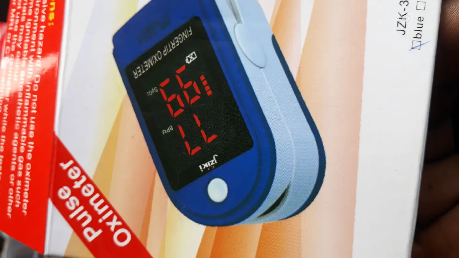 Finger Held Puse Oximeter