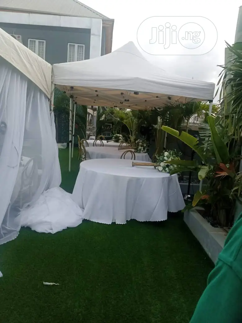 EZ UP 10ft by 10ft Tent Banquet Tables Chairs