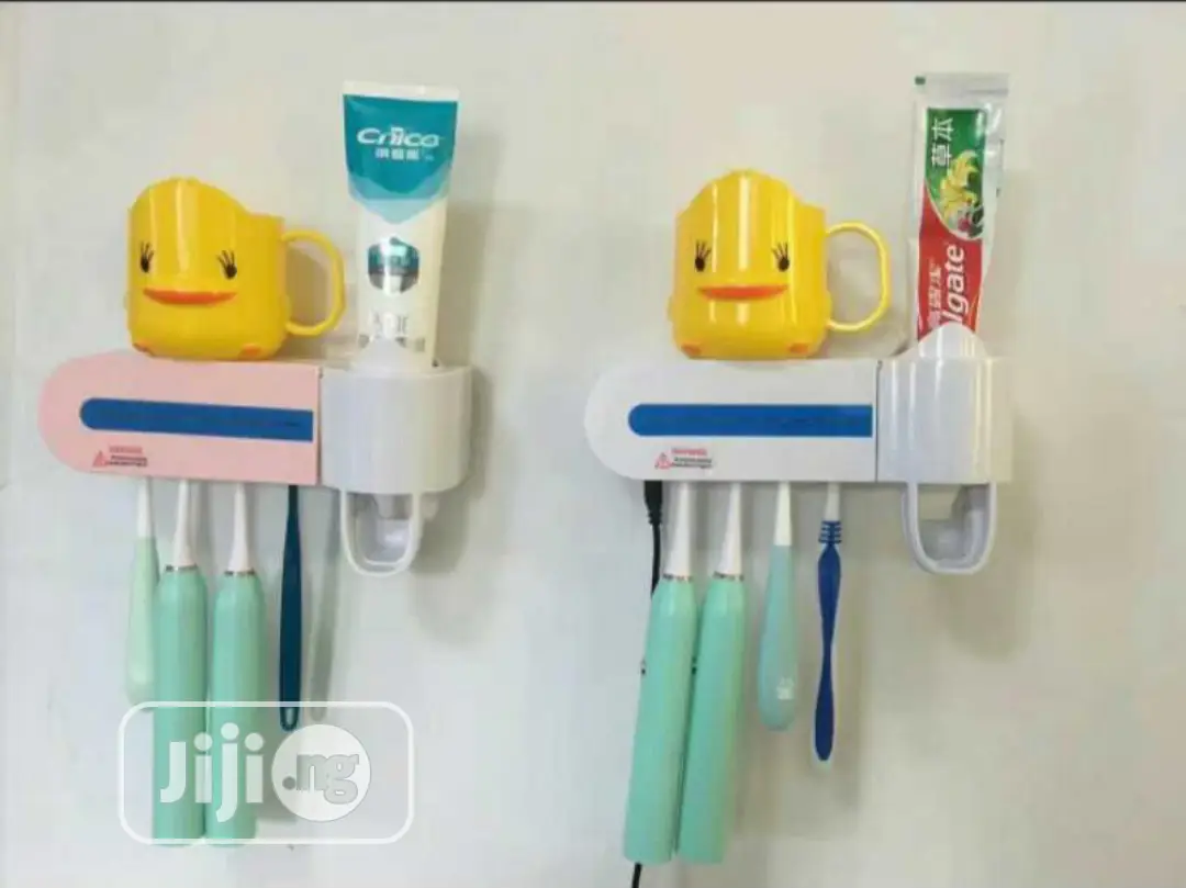 Toothbrush Sterilizer/Holder and Toothpaste Dispenser