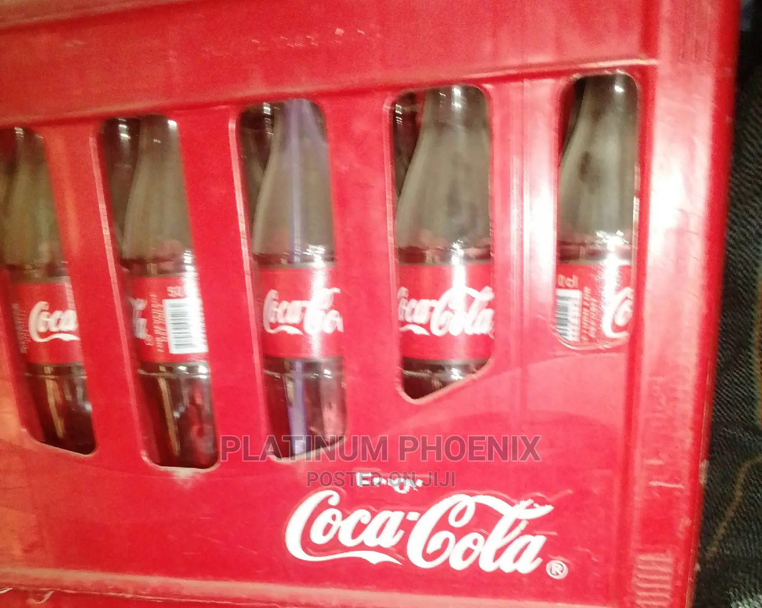 Empty Crate of Coke Bottles