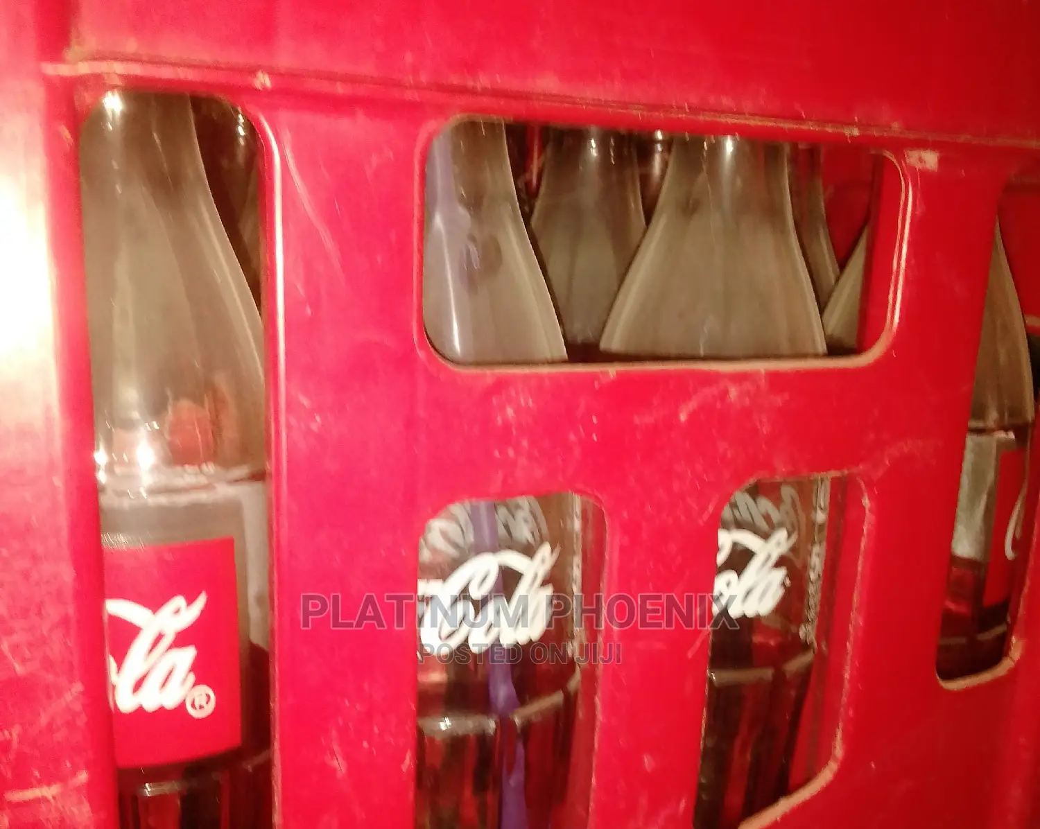 Empty Crate of Coke Bottles