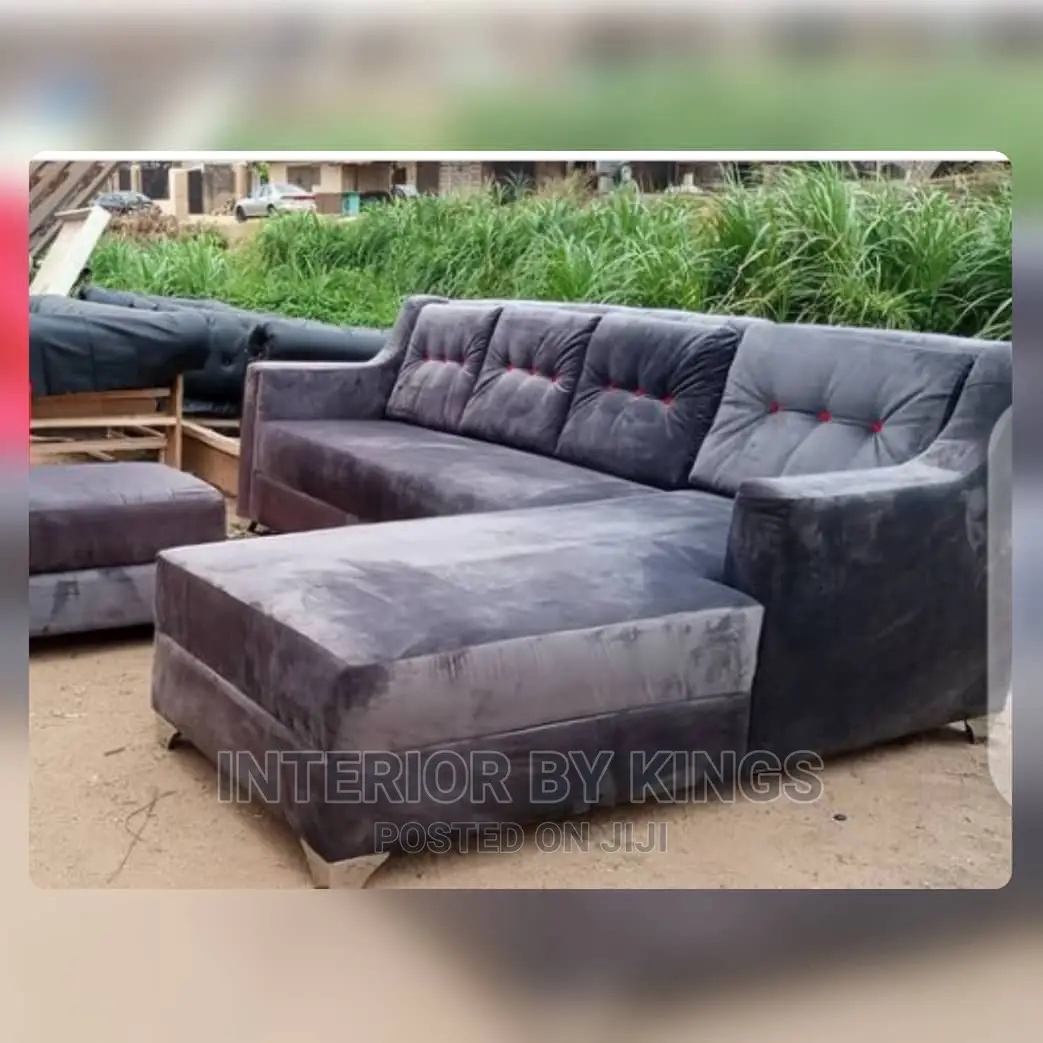 L-Shape Fabric Sofa With an Ottoman Designed With Back Rest