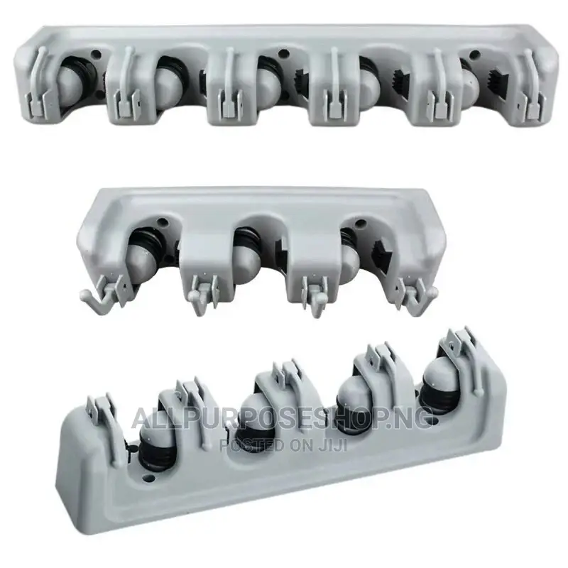 Wall Mounted Mop and Broom Holder.