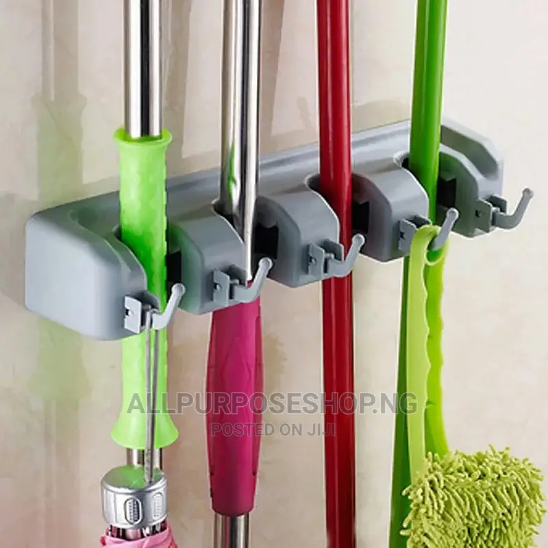 Wall Mounted Mop and Broom Holder.