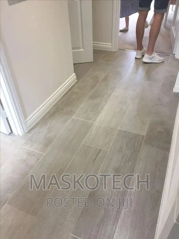 Wooden Floor Installation And Wallpaper