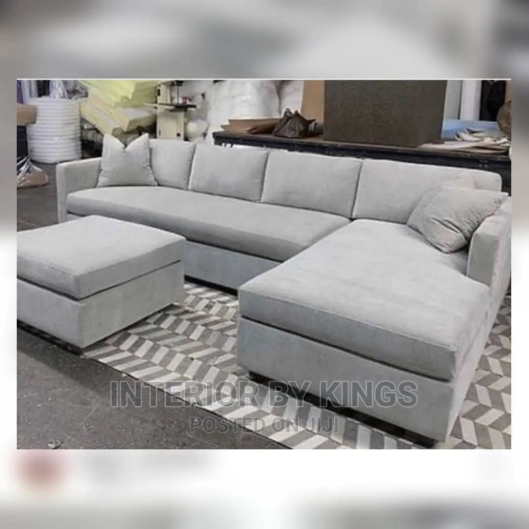 L-Shaped Fabric Sofa With an Ottoman Can Come in Colors