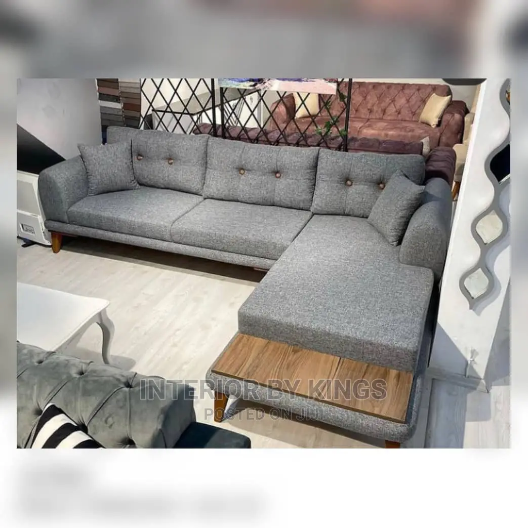 L-Shaped Fabric Sofa Designed With Wooden Remote Holder