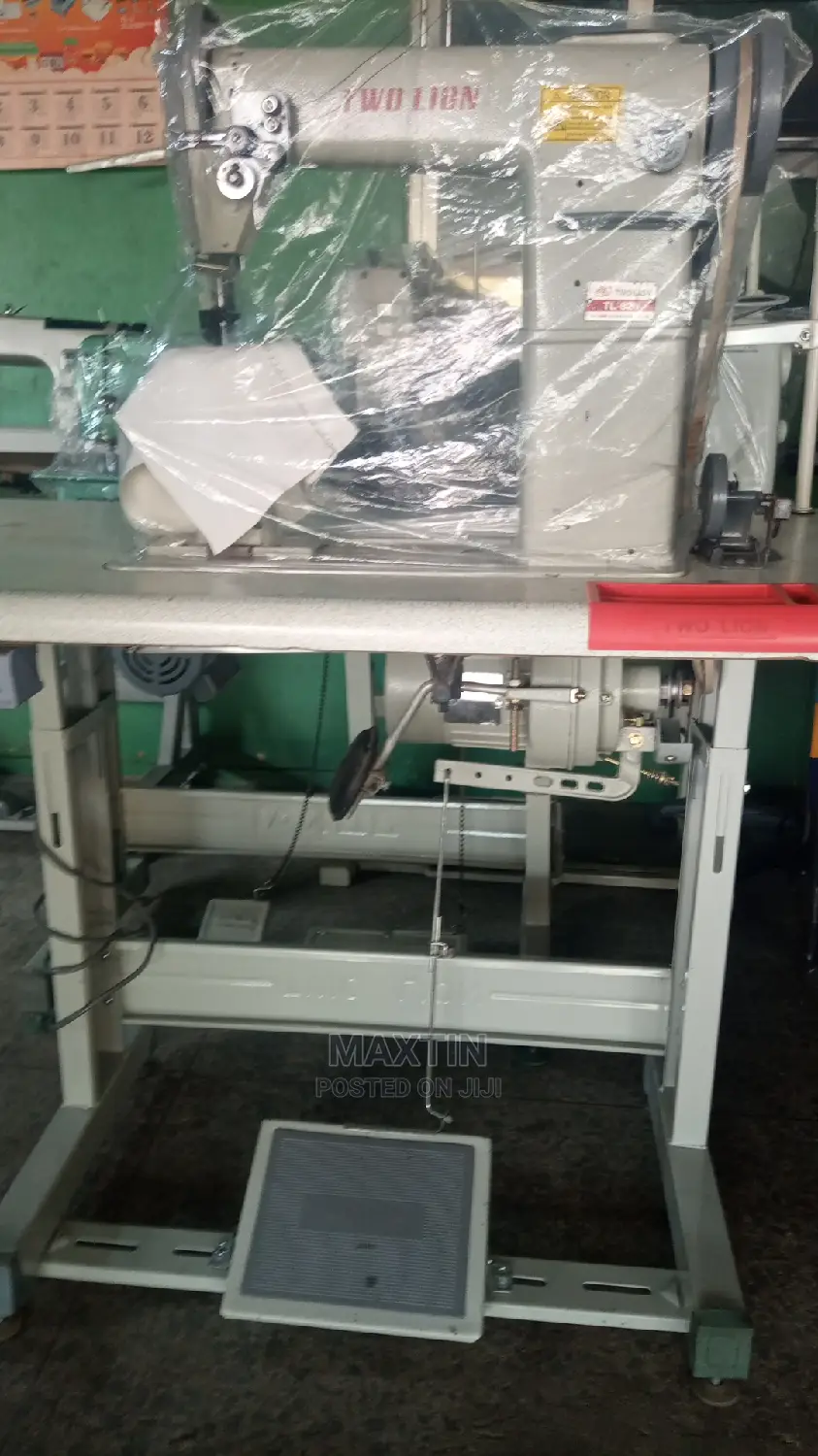 Fairly Used Two Lion Post Bed Sewing Machine