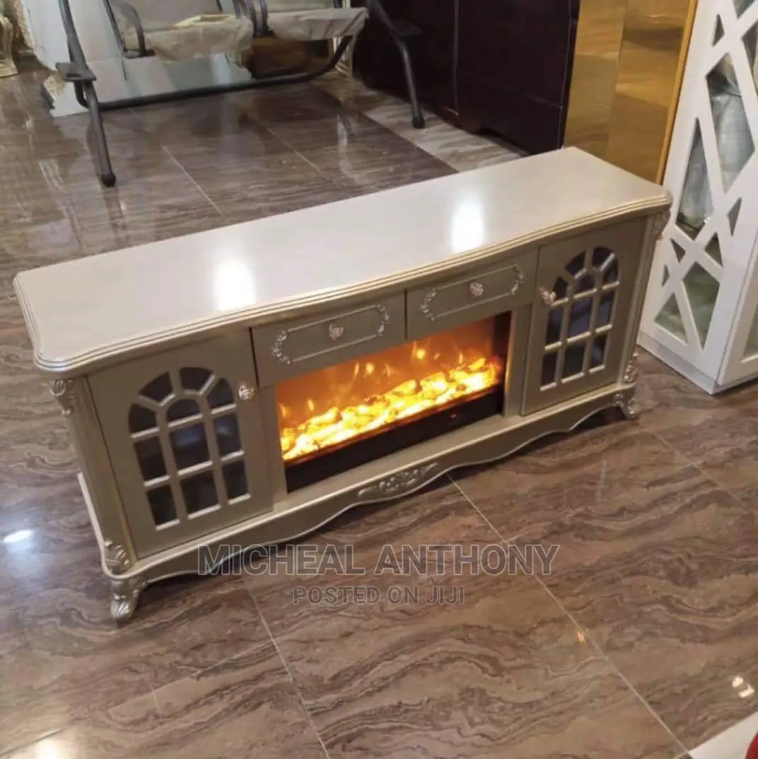 Fire Place Tv Stand. Gold Color