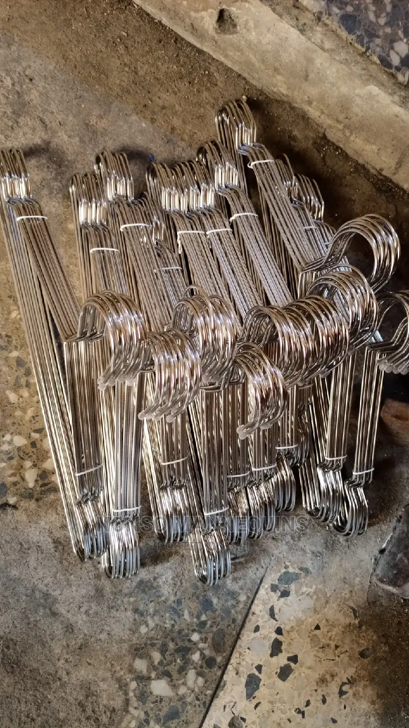A Bundle Of Stainless Steel Clothes Hangers