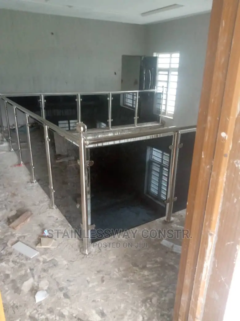 Dark Grey Glass Stainless Railings at Asokoro District