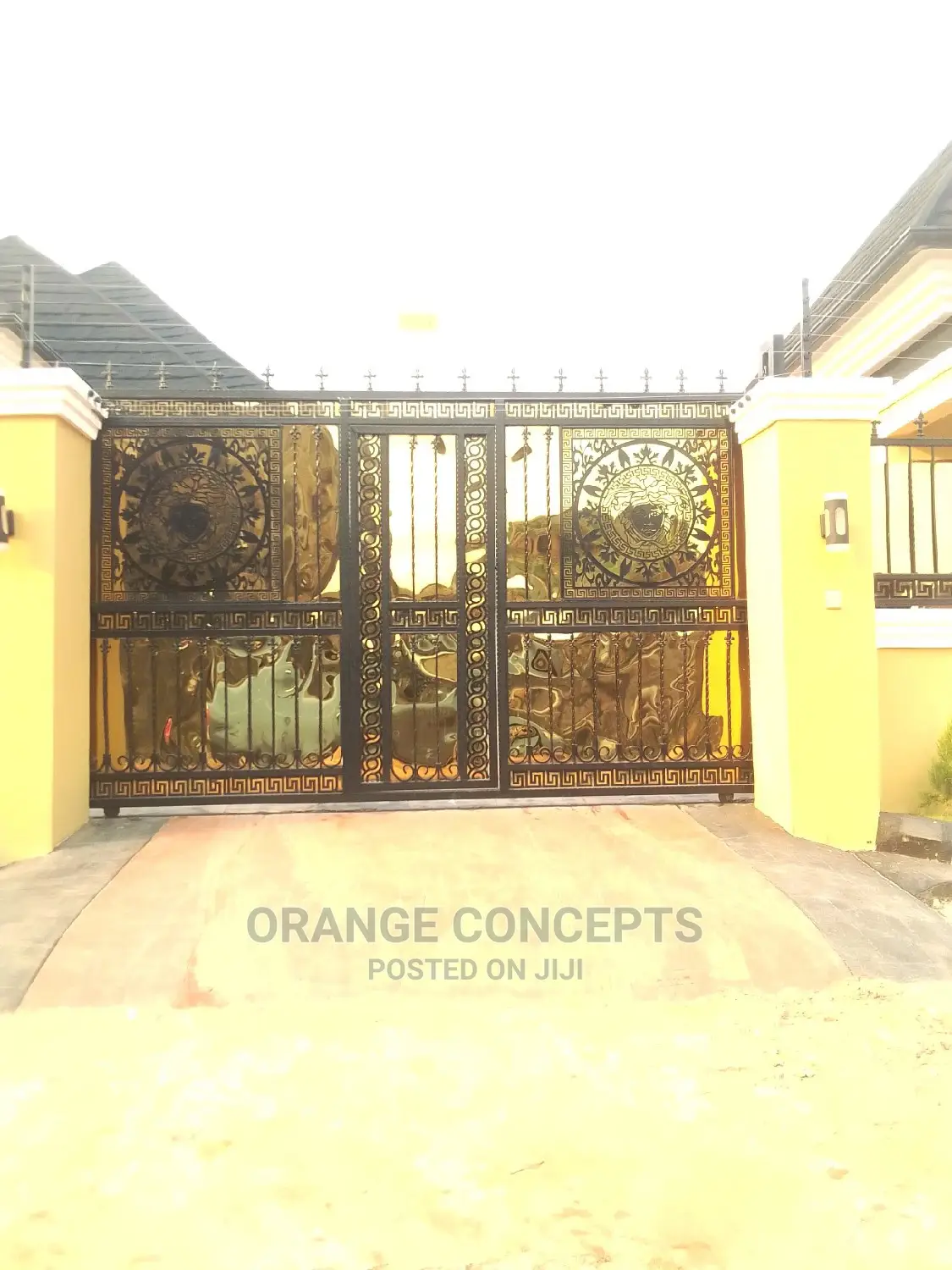 Wrought Iron Gate With Gold Plate