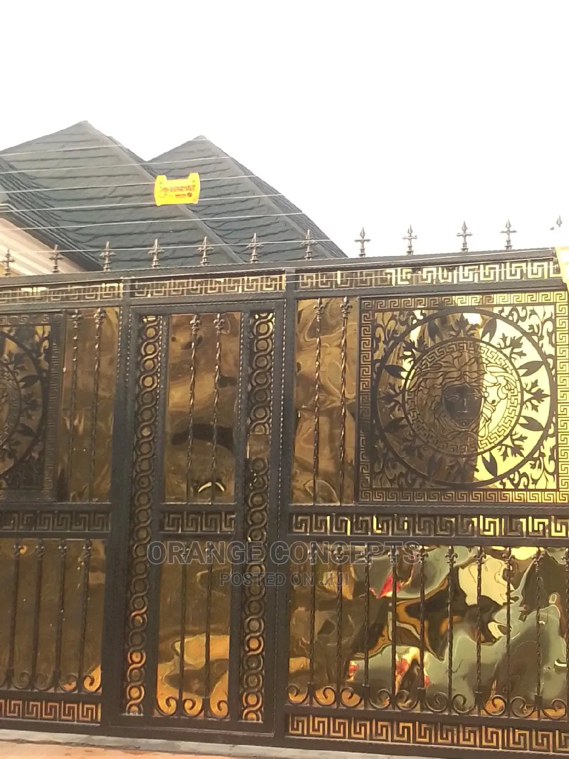 Wrought Iron Gate With Gold Plate