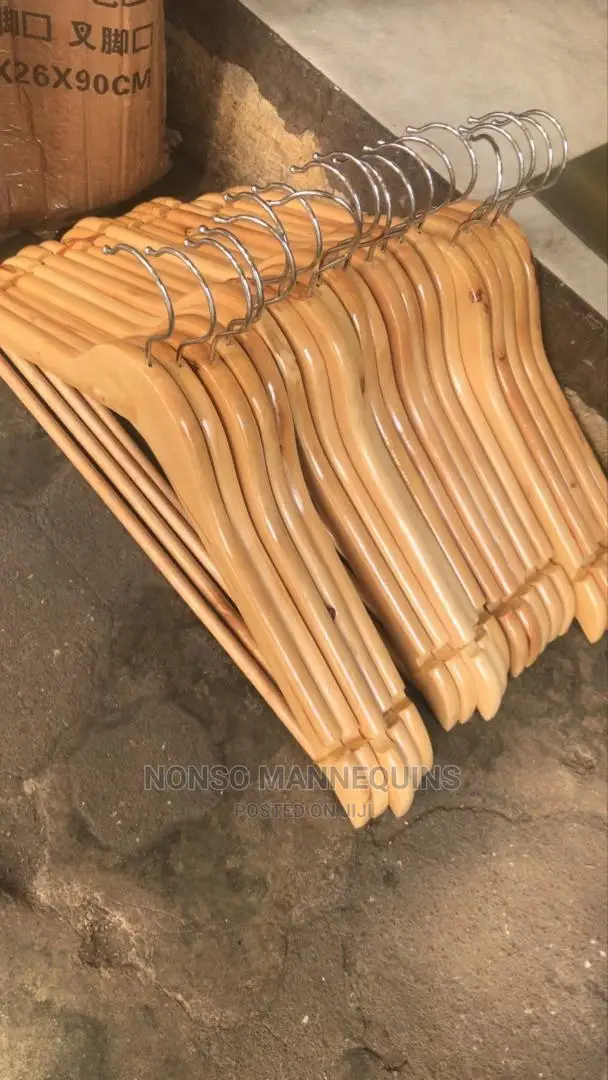 Clean And Neat Set Of Wooden Clothes Hangers