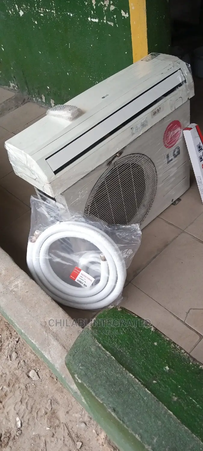 Almost New, Foreign Used 1.5HP LG Air Conditioner With Kits