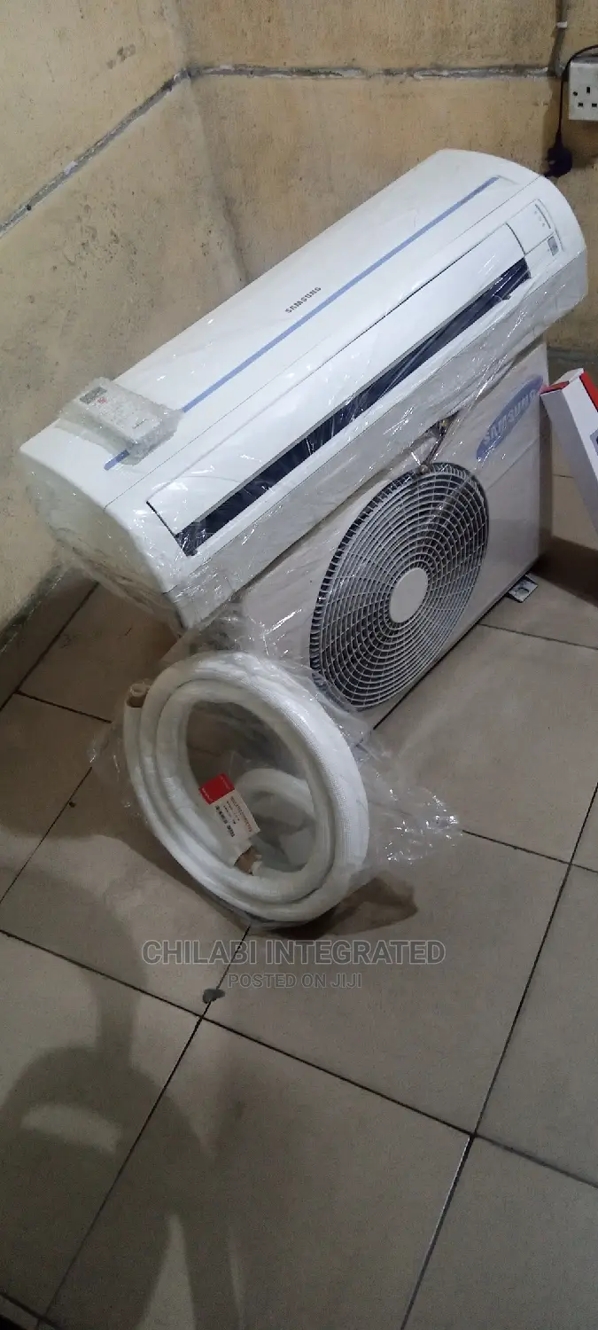 Almost New, Foreign Used 1.5HP SAMSUNG Air Conditioner +KITS