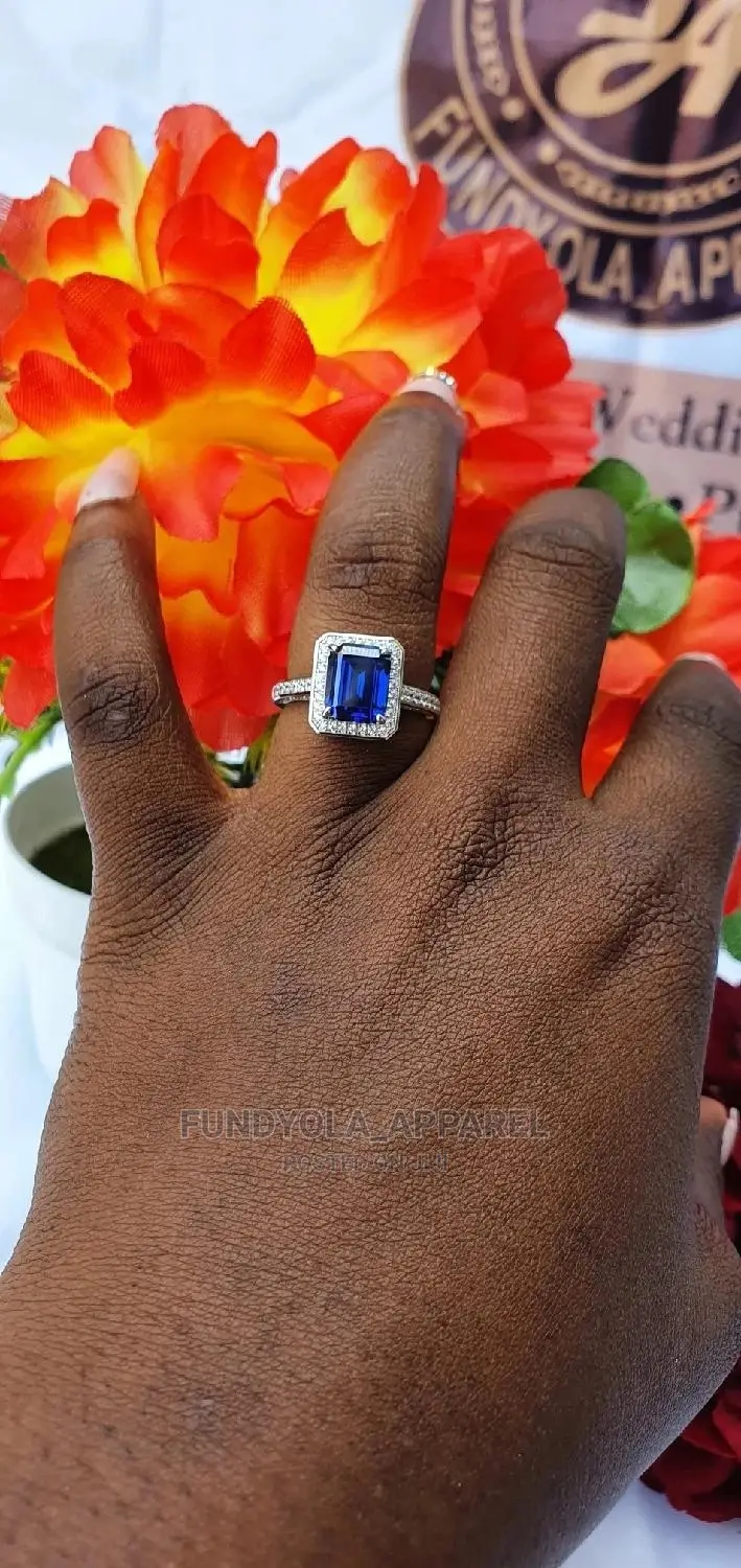 Touch Of Blue Princess Cut Engagement Ring