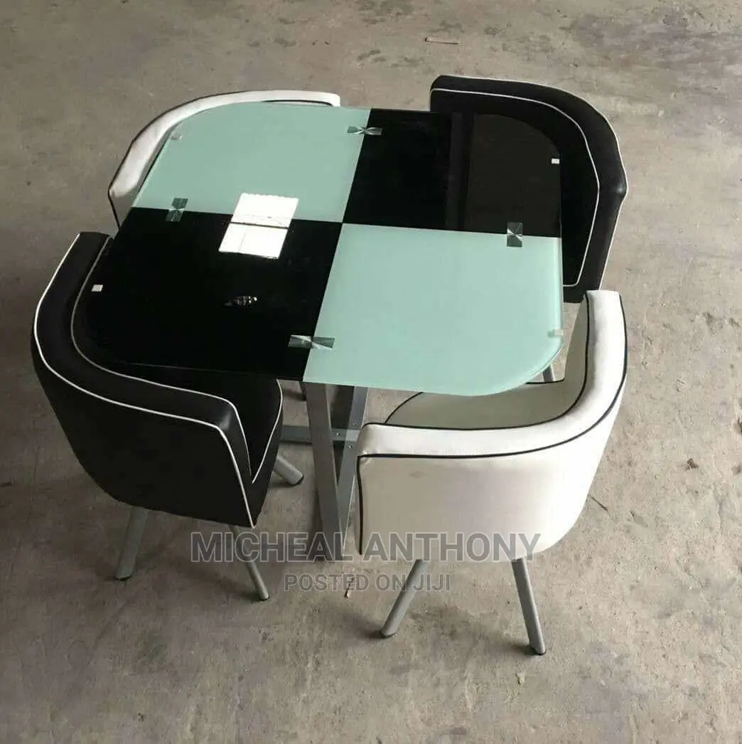 Quality Round Dining by Four With Four Unique Chairs