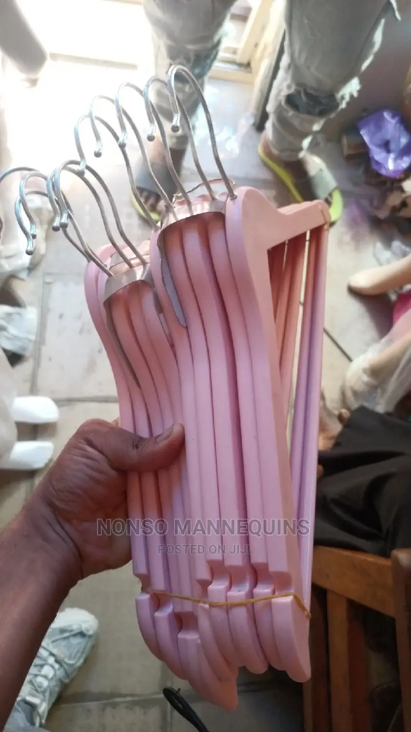 Sets of Pink Wooden Clothes Hangers