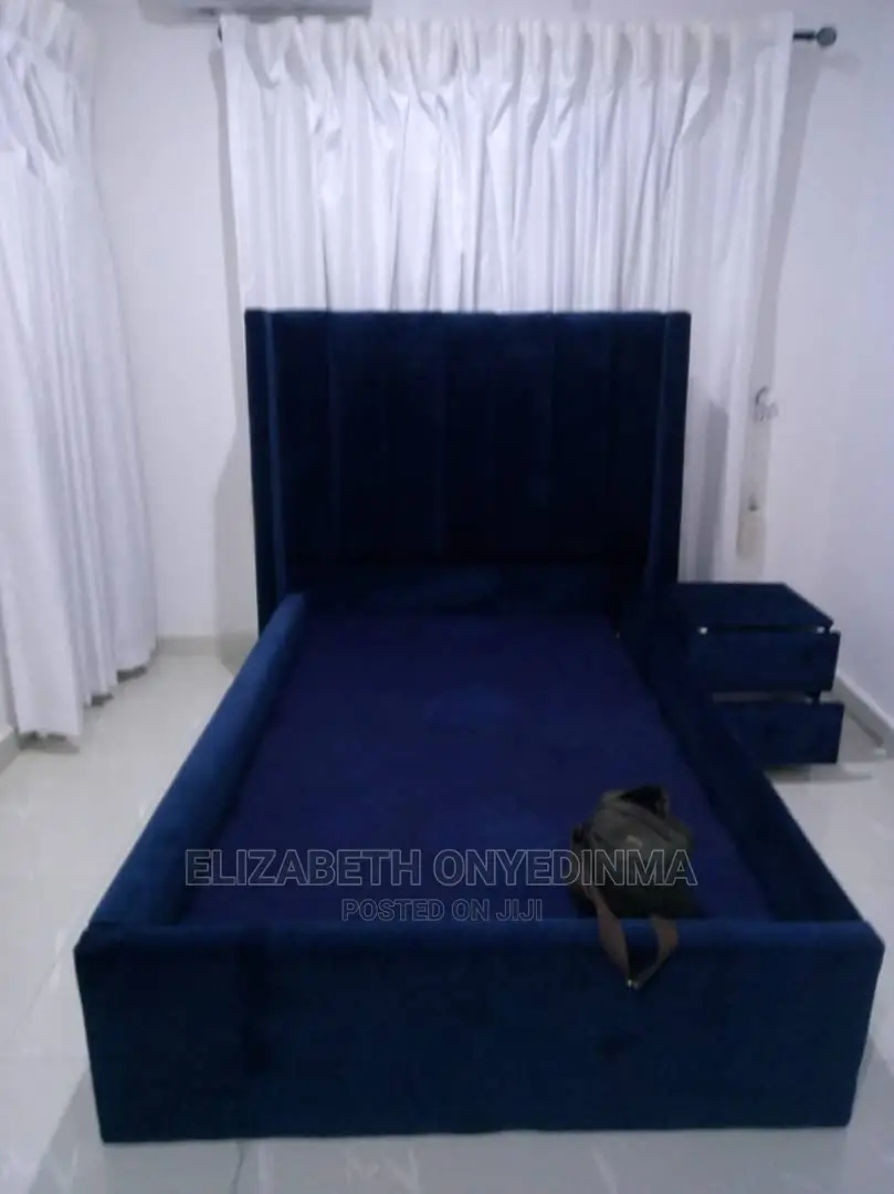4.5 by 6ft Blue Padded Bed Frame