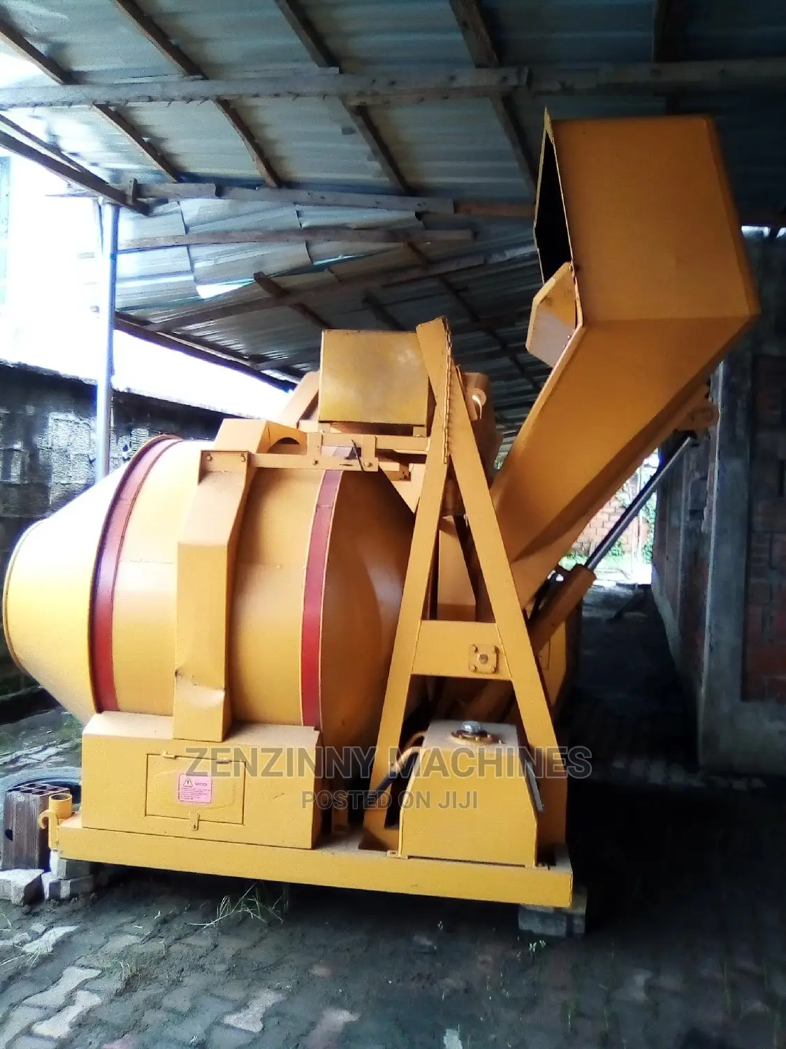 Self Load Discharge Concrete Mixer