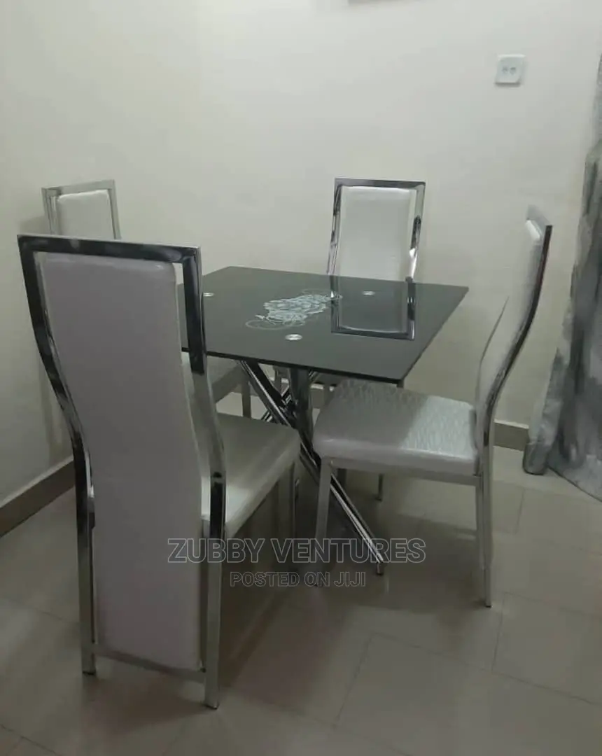 Brand New Quality Glass Dining With Four Chairs