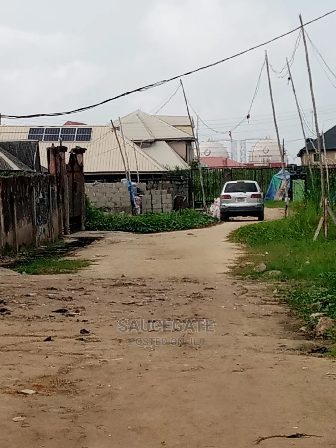 Half Plot for Sale at Ijegun Satellite Chemist Busstop Axis